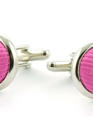 Ronde manchetknopen zijde inleg met fuchsia zijde inleg voor een verfijnd accent.