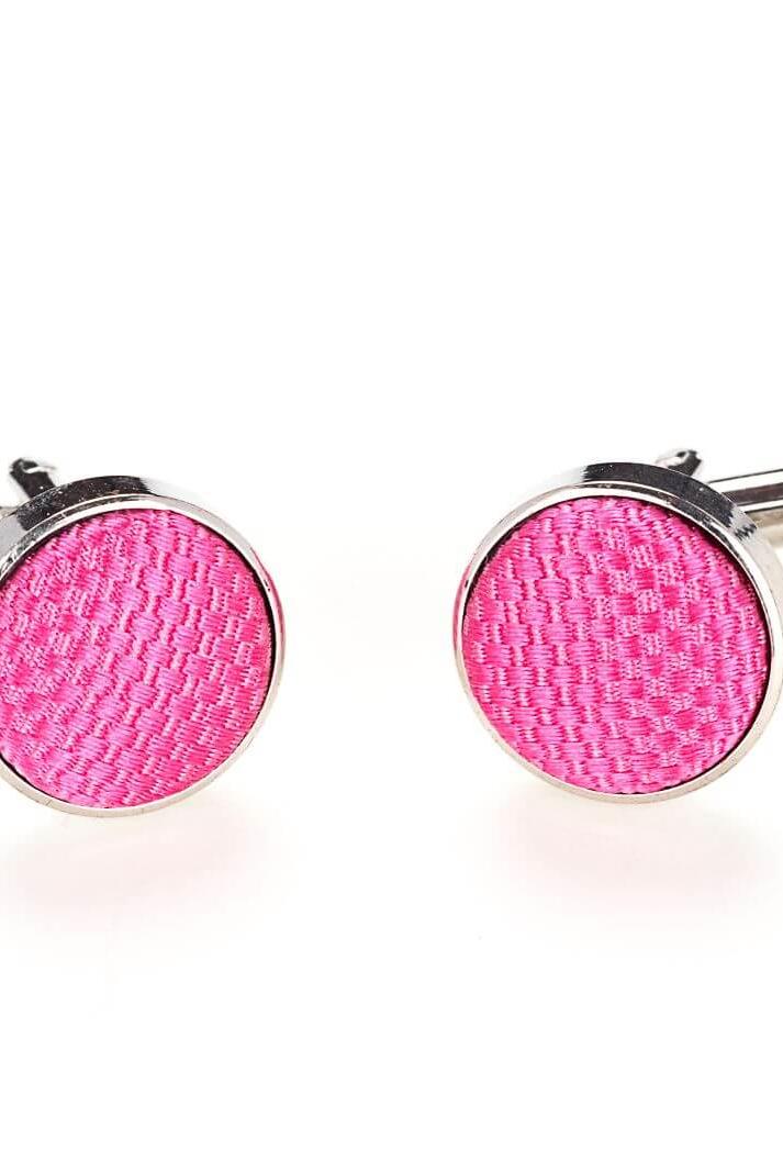 Manchetknopen zijde uni NOS in fuchsiakleurige zijde met glanzende afwerking.