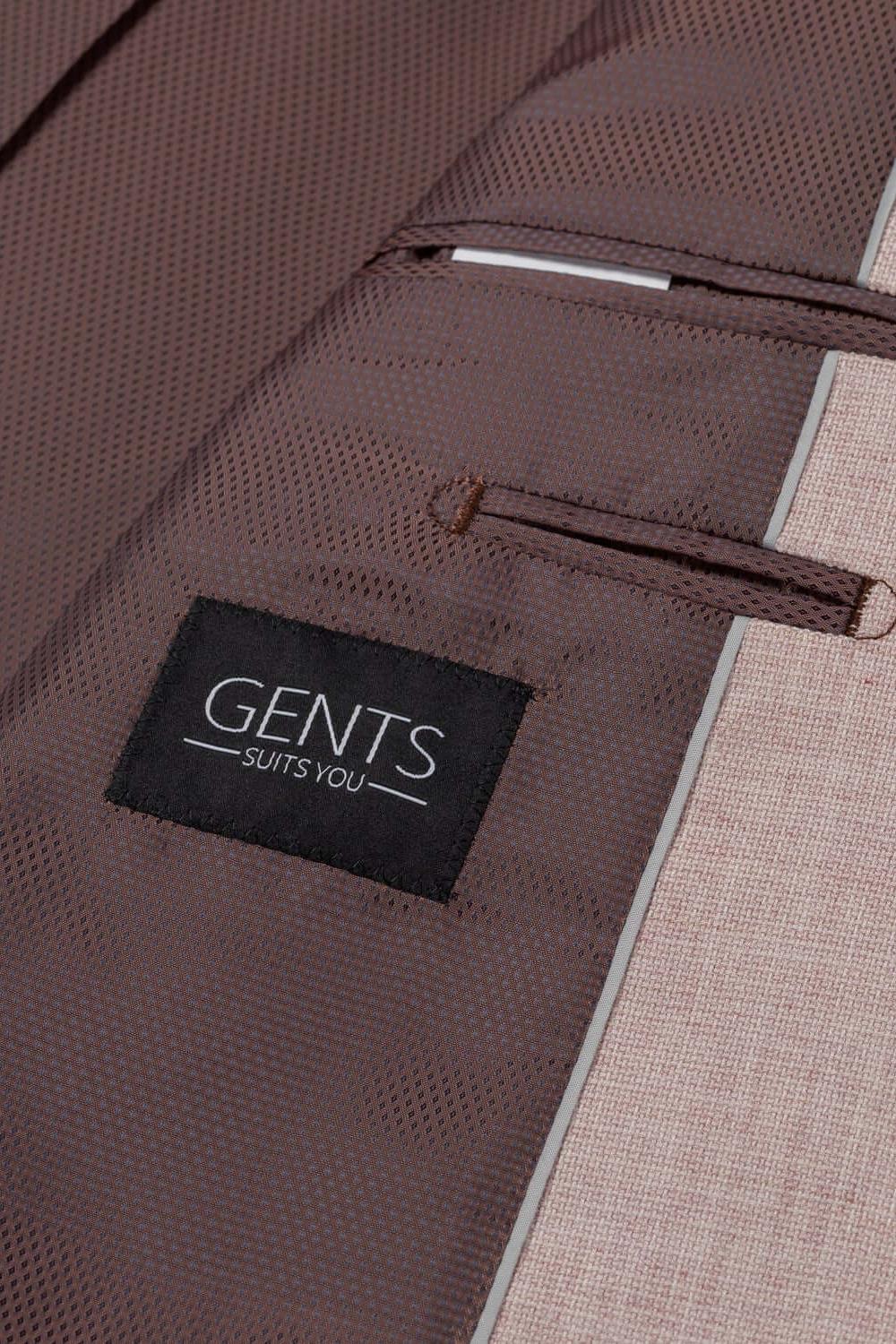 Pak lichtroze 3-delig detail met binnenvoering en GENTS logo zichtbaar, modern ontwerp.