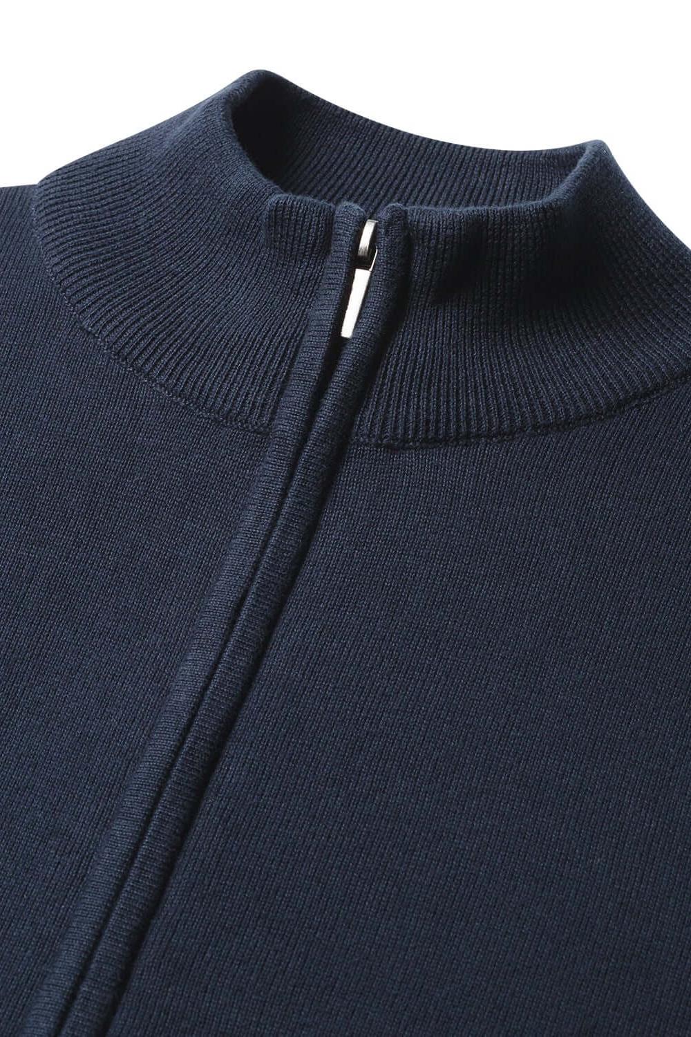 Close-up view of a Full zip navy jacket with a smooth zip closure and high collar design.