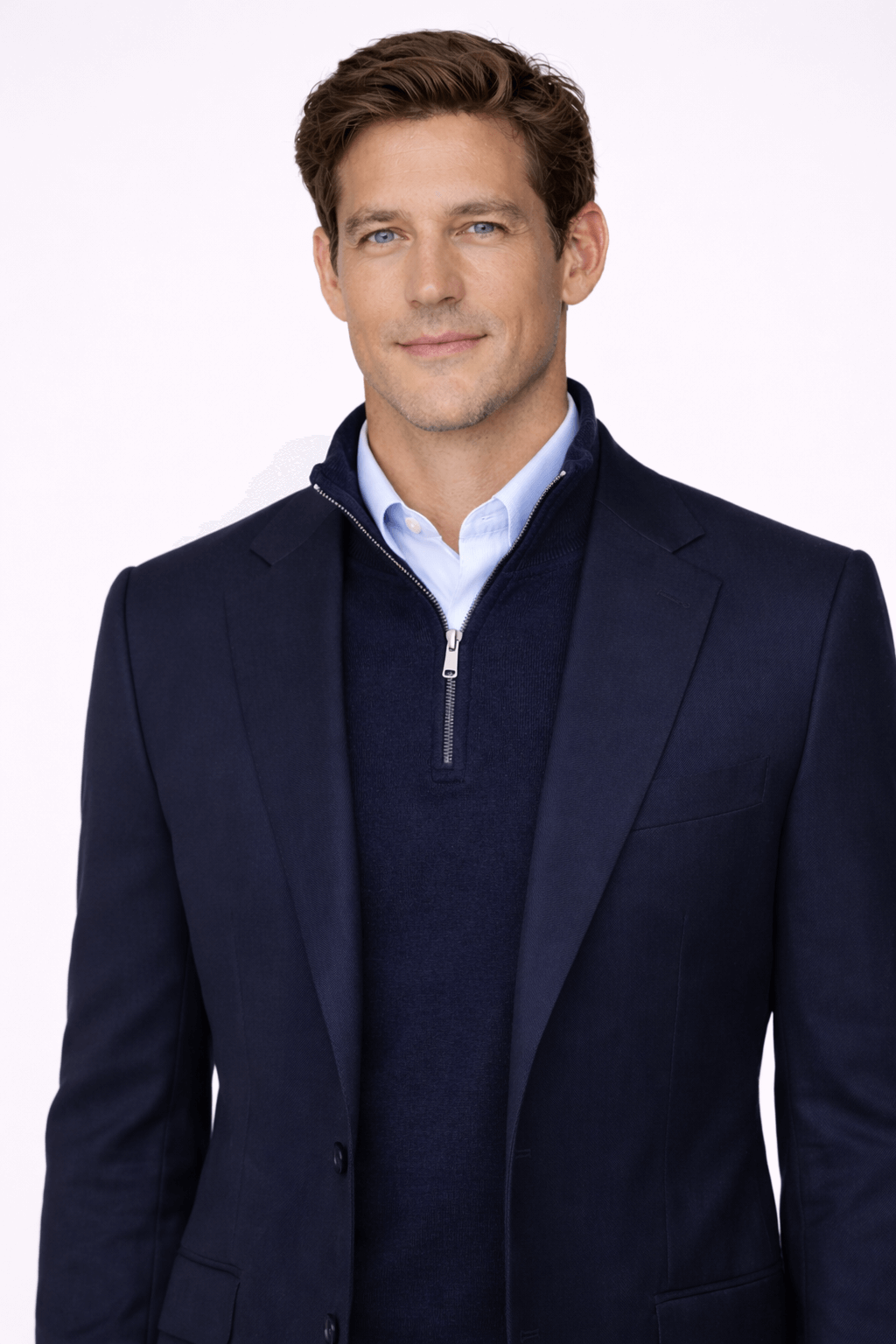 Man in navy ton-sur-ton look outfit combining jacket and sweater.