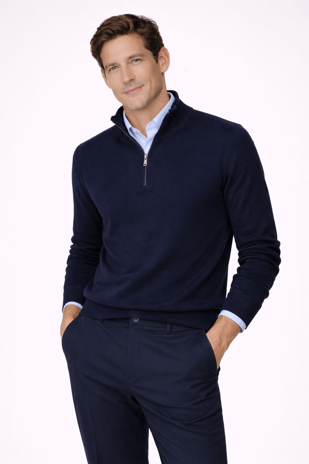 Man in a navy pullover showcasing a Ton-sur-ton look with matching dark pants.