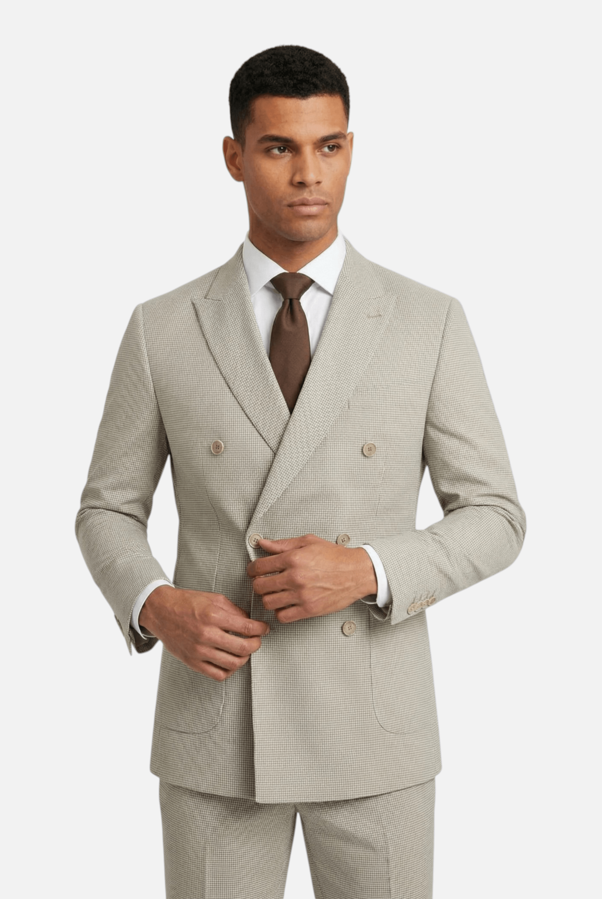 Pak Double-breasted pied-de-poule beige 2-delig model wearing a stylish suit with a brown tie.