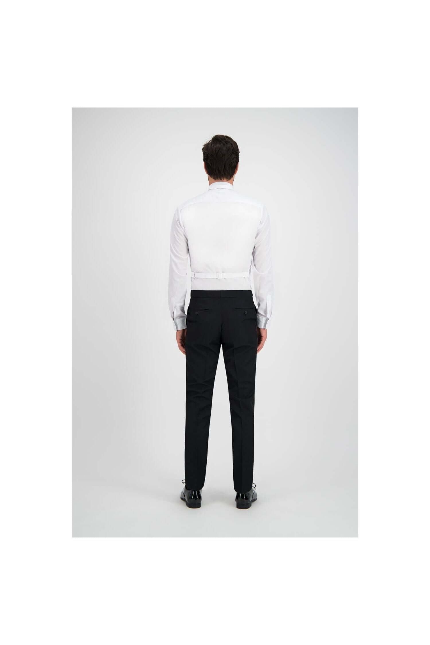 Man wearing a Rokkostuum compleet, showcasing the back design and tailored fit for formal occasions.