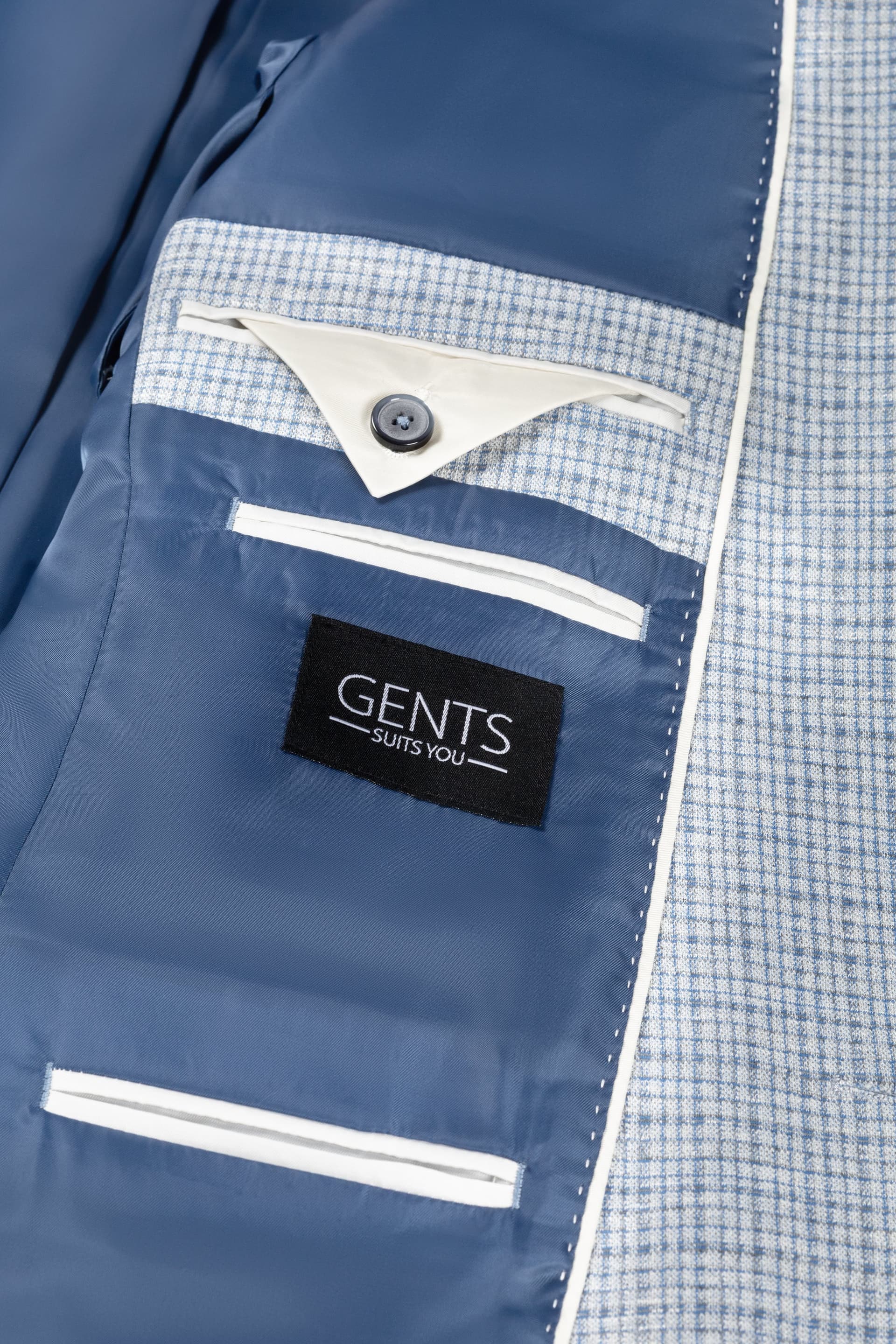 Colbert miniruit lichtblauw met stijlvolle binnenvoering en zakdetails.