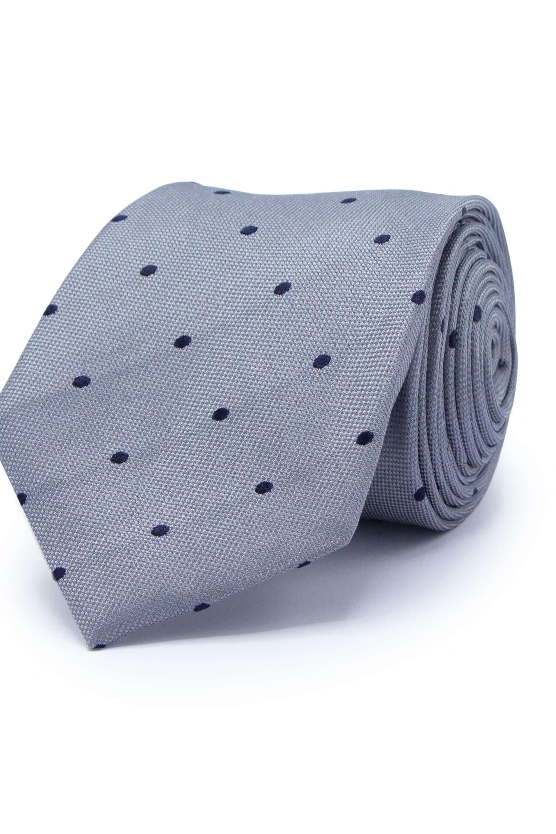 Stropdas zijde met een lichtgrijze basis en donkerblauwe stippen, perfect voor formele gelegenheden.