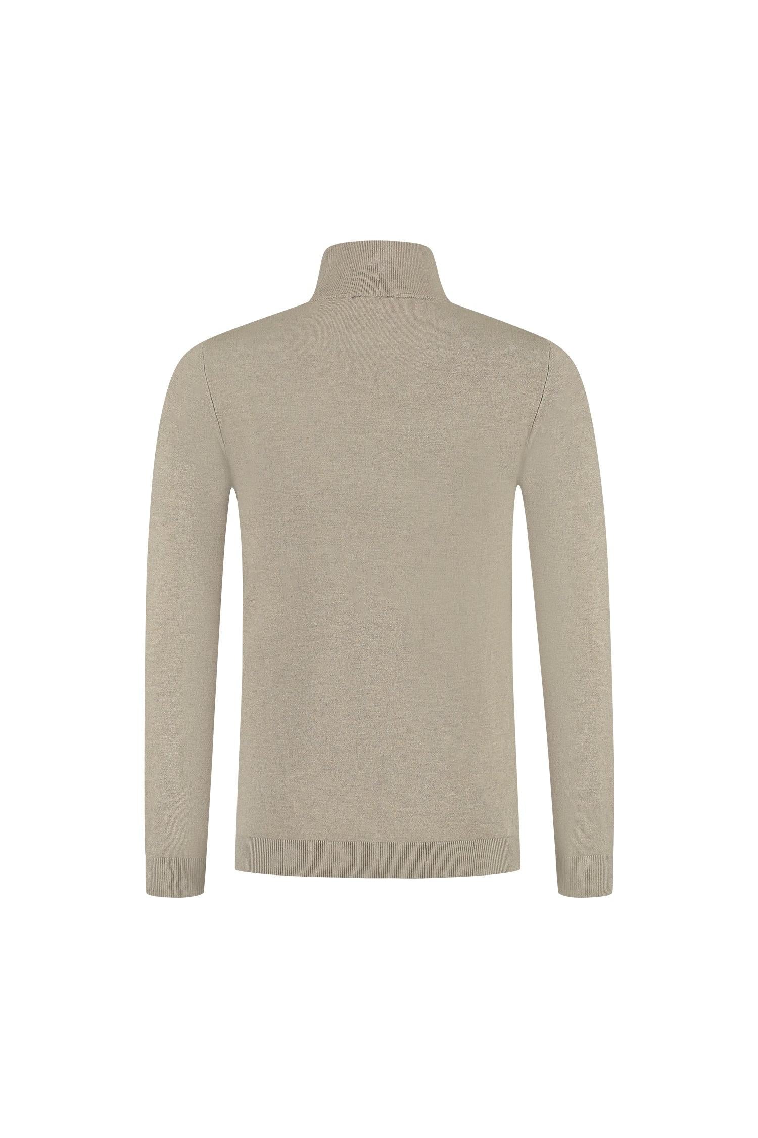 A back view of the Turtle neck khaki sweater, featuring a soft and wrinkle-resistant design.
