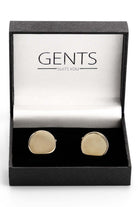 Manchetknopen rond - goud in elegante verpakking van GENTS, goudkleurige roestvrijstalen manchetknopen met subtiele glans.
