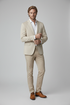 Colbert stretchkatoen zand - pose 2