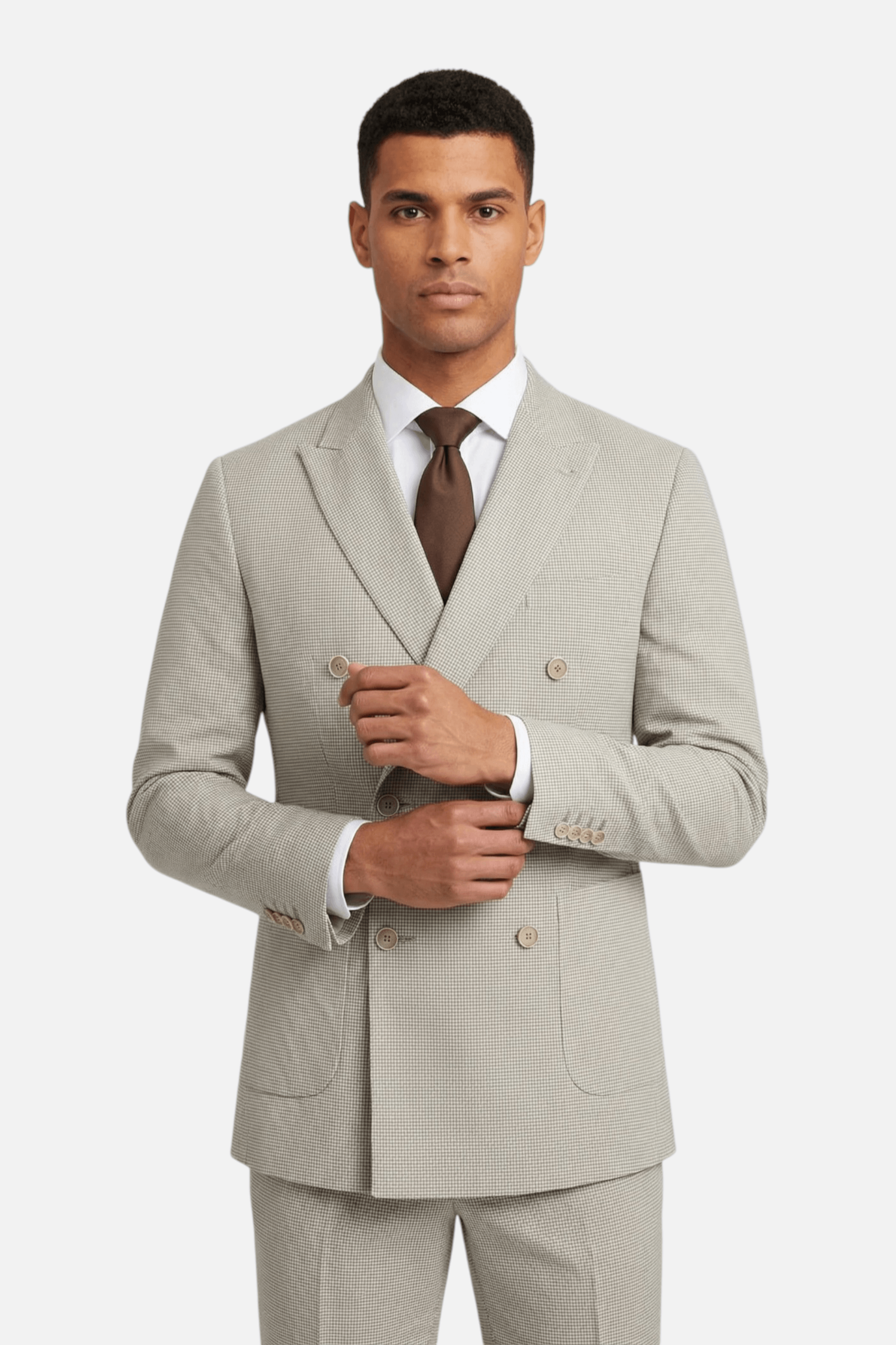 Pak Double-breasted pied-de-poule beige 2-delig worn by a man standing confidently.